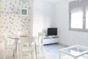 TV a/nebo společenská místnost v ubytování Stay U-nique Apartments Salitre