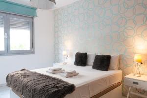 Postel nebo postele na pokoji v ubytování Stay U-nique Apartments Salitre