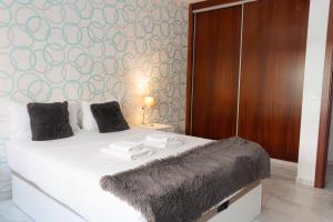 Postel nebo postele na pokoji v ubytování Stay U-nique Apartments Salitre