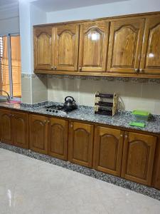 Kuchyň nebo kuchyňský kout v ubytování appartement confortable