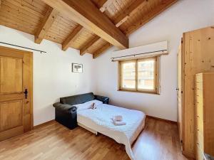 Letto o letti in una camera di L Eau Vive Combles
