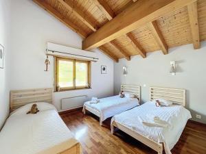 Postel nebo postele na pokoji v ubytování L Eau Vive Combles
