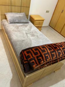 Postel nebo postele na pokoji v ubytování appartement confortable