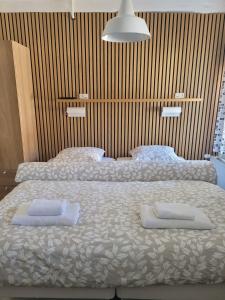 Postel nebo postele na pokoji v ubytování Bjerremark Hotel og Kursuscenter