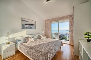 Posteľ alebo postele v izbe v ubytovaní Apartment AnteV