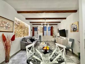a living room with a couch and a table at Luxury Centre, Cagliari, Sardegna by Home&Experience in Cagliari