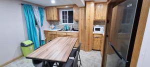 Kuchyň nebo kuchyňský kout v ubytování Olivia's Island Serenity Apt1