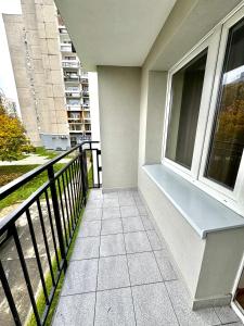 a balcony of a building with a window at Piekary C in Legnica
