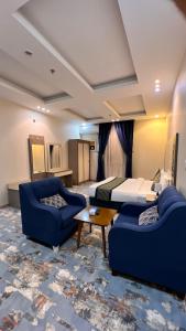 Ένα ή περισσότερα κρεβάτια σε δωμάτιο στο Quel Serviced Units
