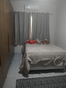 Katil atau katil-katil dalam bilik di Casa da Edna