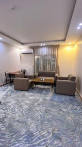 Χώρος καθιστικού στο Quel Serviced Units