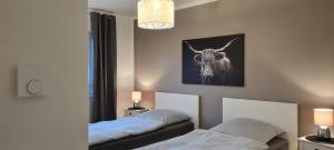 Postel nebo postele na pokoji v ubytování Mutti 's Haus -Zur Südheide