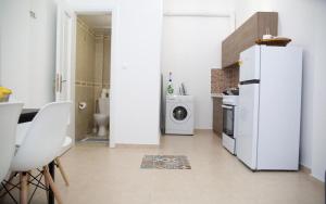 Kuchyň nebo kuchyňský kout v ubytování Aimou Studio's Apartment's