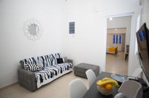 TV a/nebo společenská místnost v ubytování Aimou Studio's Apartment's