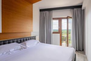 Postel nebo postele na pokoji v ubytování Precise House Montaperti Siena