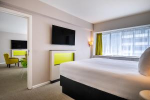 Postel nebo postele na pokoji v ubytování Thon Hotel Brussels City Centre