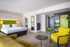 Postel nebo postele na pokoji v ubytování Thon Hotel Brussels City Centre