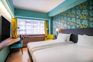 Postel nebo postele na pokoji v ubytování Thon Hotel Brussels City Centre