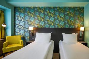 Postel nebo postele na pokoji v ubytování Thon Hotel Brussels City Centre
