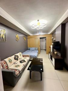 TV/trung tâm giải trí tại Kathys crib 32sqm Condo Shell Residences