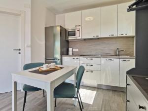Kuchyň nebo kuchyňský kout v ubytování Studio Apartment Glorijeta + 21 fotografií