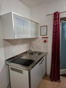Kuchyň nebo kuchyňský kout v ubytování Bed&Breakfast L'Oasi