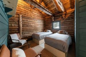 Postel nebo postele na pokoji v ubytování ÖBois Charlevoix - L'Écurie 2 Studio
