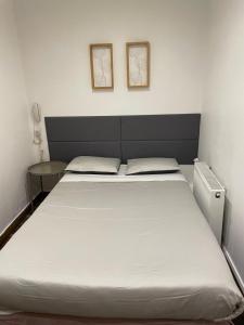 Кровать или кровати в номере Hôtel de l'Europe