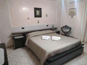 Posteľ alebo postele v izbe v ubytovaní La casa della Vittoria