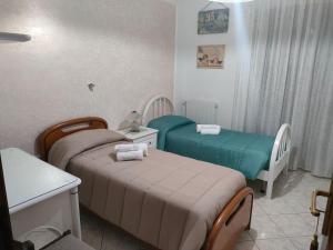 Posteľ alebo postele v izbe v ubytovaní La casa della Vittoria