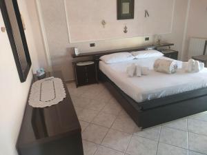 Posteľ alebo postele v izbe v ubytovaní La casa della Vittoria