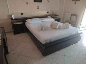 Posteľ alebo postele v izbe v ubytovaní La casa della Vittoria