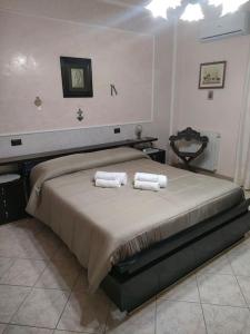 Posteľ alebo postele v izbe v ubytovaní La casa della Vittoria