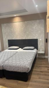Кровать или кровати в номере Hôtel de l'Europe