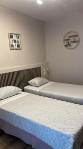 Кровать или кровати в номере Hôtel de l'Europe