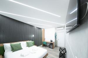 TV a/nebo společenská místnost v ubytování New Luxury Rooms