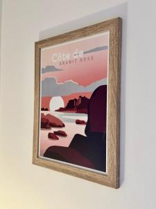 a picture of a painting on a wall at Le Nantais, centre de Rennes avec garage privé in Rennes +6 photos