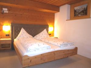 Postel nebo postele na pokoji v ubytování Appartement im Dorf