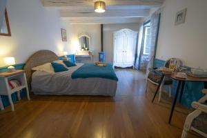 Letto o letti in una camera di Le Clos du Barry