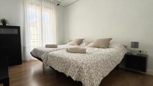 Postel nebo postele na pokoji v ubytování Apartamento Tu Sitio