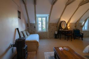 Letto o letti in una camera di Le Clos du Barry