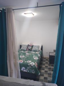 Postel nebo postele na pokoji v ubytování Ti coin panoramique