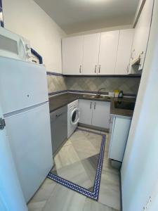 Kuchyň nebo kuchyňský kout v ubytování Apartamento Mar Puerto Sherry