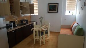Eldhús eða eldhúskrókur á Tonis Apartment +8 myndir