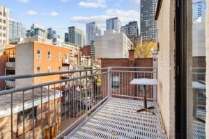 a balcony with a view of a city at Beautiful Lofts in Downtown Montreal in Montréal