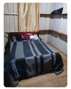 Postel nebo postele na pokoji v ubytování Casa Osa Bella Cabina Rayo Verde