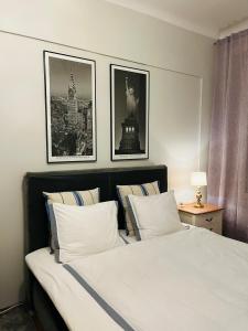 Ένα ή περισσότερα κρεβάτια σε δωμάτιο στο White Star Uppsala City