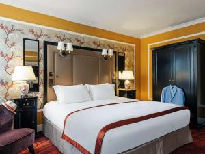 Postel nebo postele na pokoji v ubytování Hotel Rotary Geneva - MGallery
