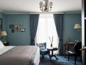 Postel nebo postele na pokoji v ubytování Hotel Rotary Geneva - MGallery