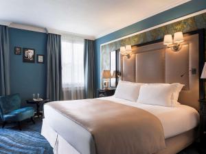 Postel nebo postele na pokoji v ubytování Hotel Rotary Geneva - MGallery